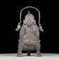 A precious bronze figure carrying a kettle