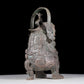 A precious bronze figure carrying a kettle