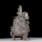 A precious bronze figure carrying a kettle