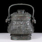 A precious bronze animal-faced pot