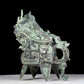 A precious bronze auspicious animal holding pot