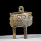 A precious bronze animal-faced two-eared and tripod furnace