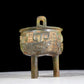 A precious bronze animal-faced two-eared and tripod furnace