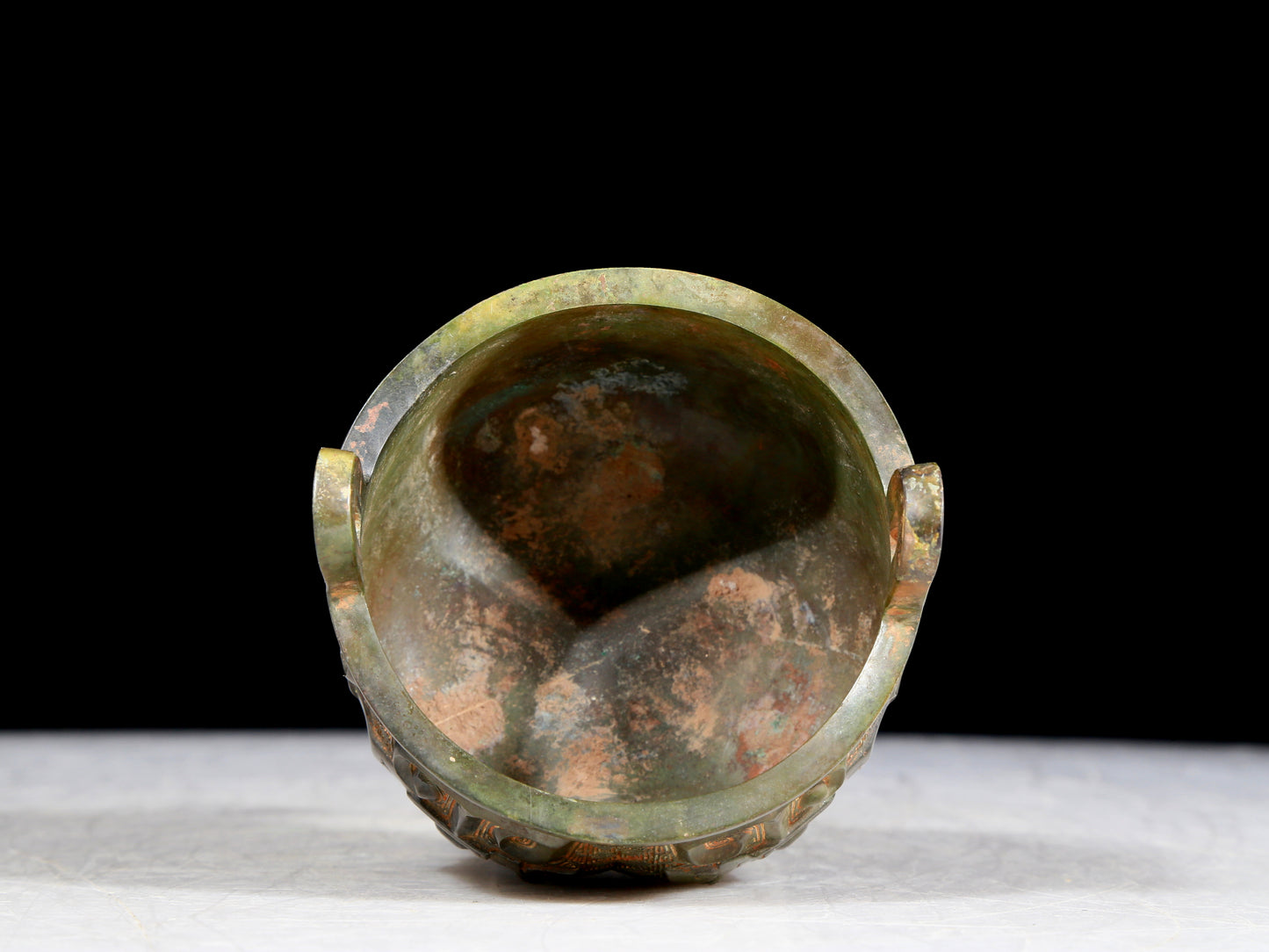 A precious bronze animal-faced two-eared and tripod furnace