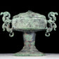 A precious bronze dragon-patterned double-eared stove with lid