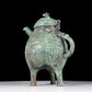 A precious bronze tripod ewer with animal masks