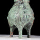 A precious bronze tripod ewer with animal masks