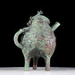 A precious bronze tripod ewer with animal masks