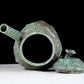 A precious bronze tripod ewer with animal masks