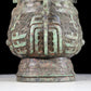 A precious bronze animal-faced pot