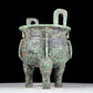 A precious bronze animal-faced two-eared and tripod furnace