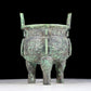 A precious bronze animal-faced two-eared and tripod furnace