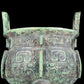 A precious bronze animal-faced two-eared and tripod furnace