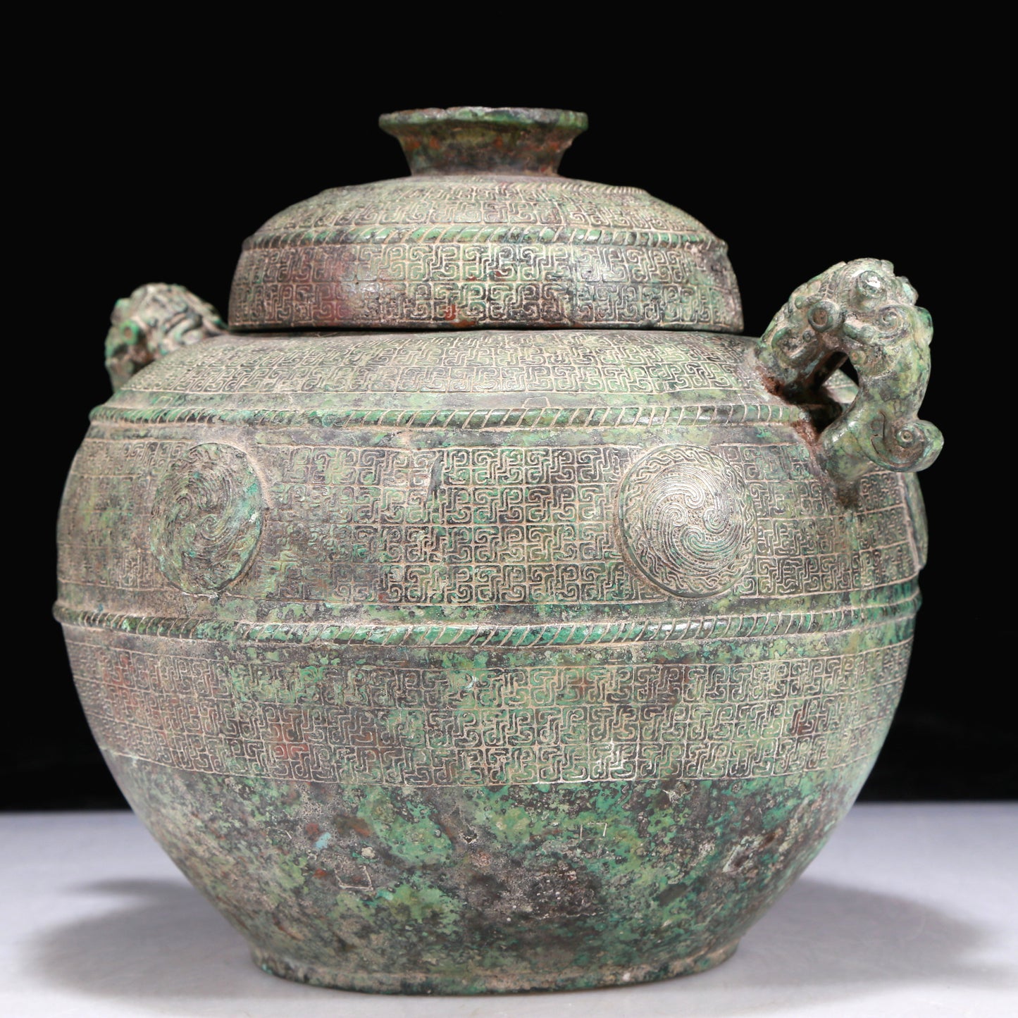 A Precious Bronze 'Dragon' Beast-Handled Jar And Cover