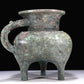 A Precious Bronze 'Dragon' Tripod Ewer