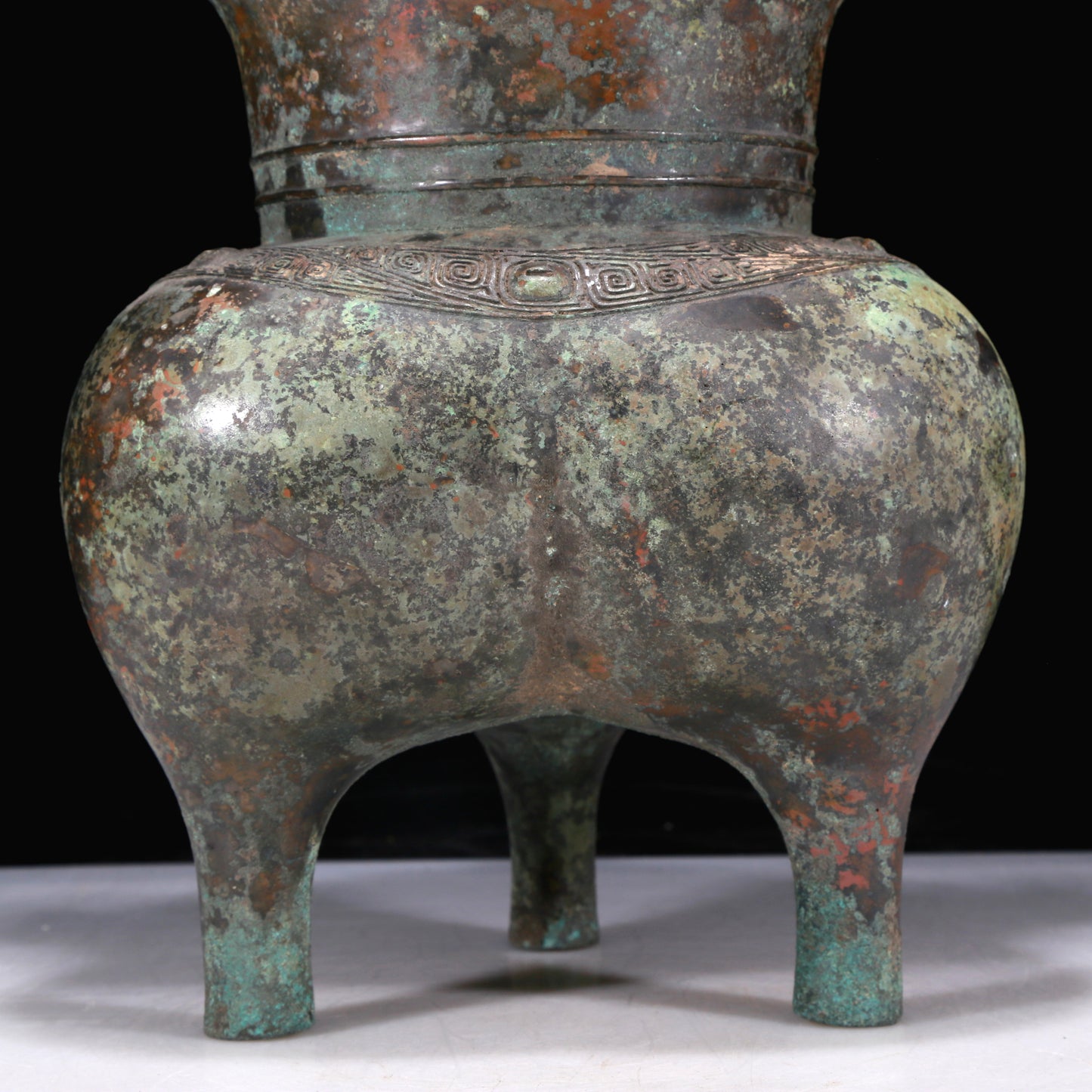 A Precious Bronze 'Auspicious Beast' Tripod Cup