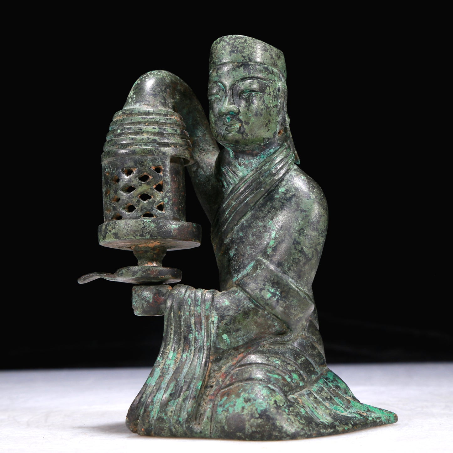 A Precious Bronze Figure-Form Candlestick