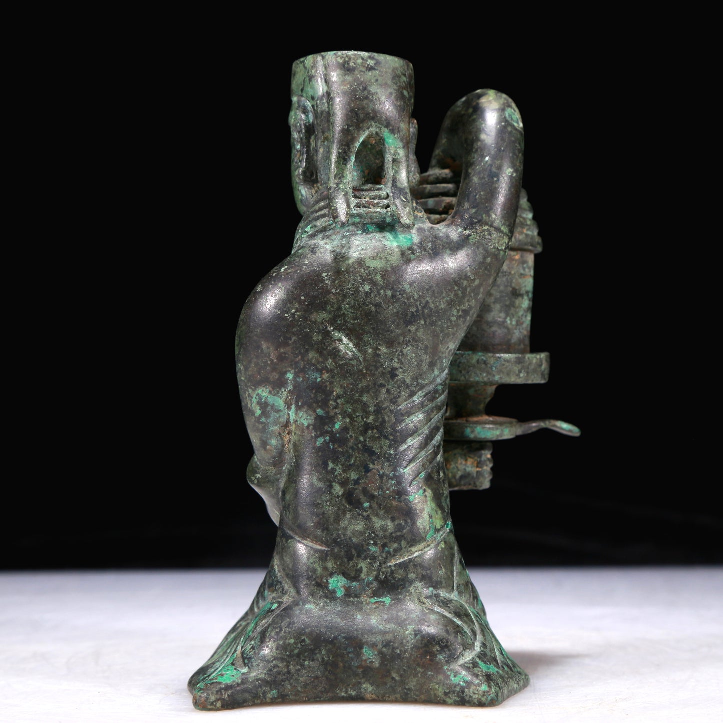 A Precious Bronze Figure-Form Candlestick