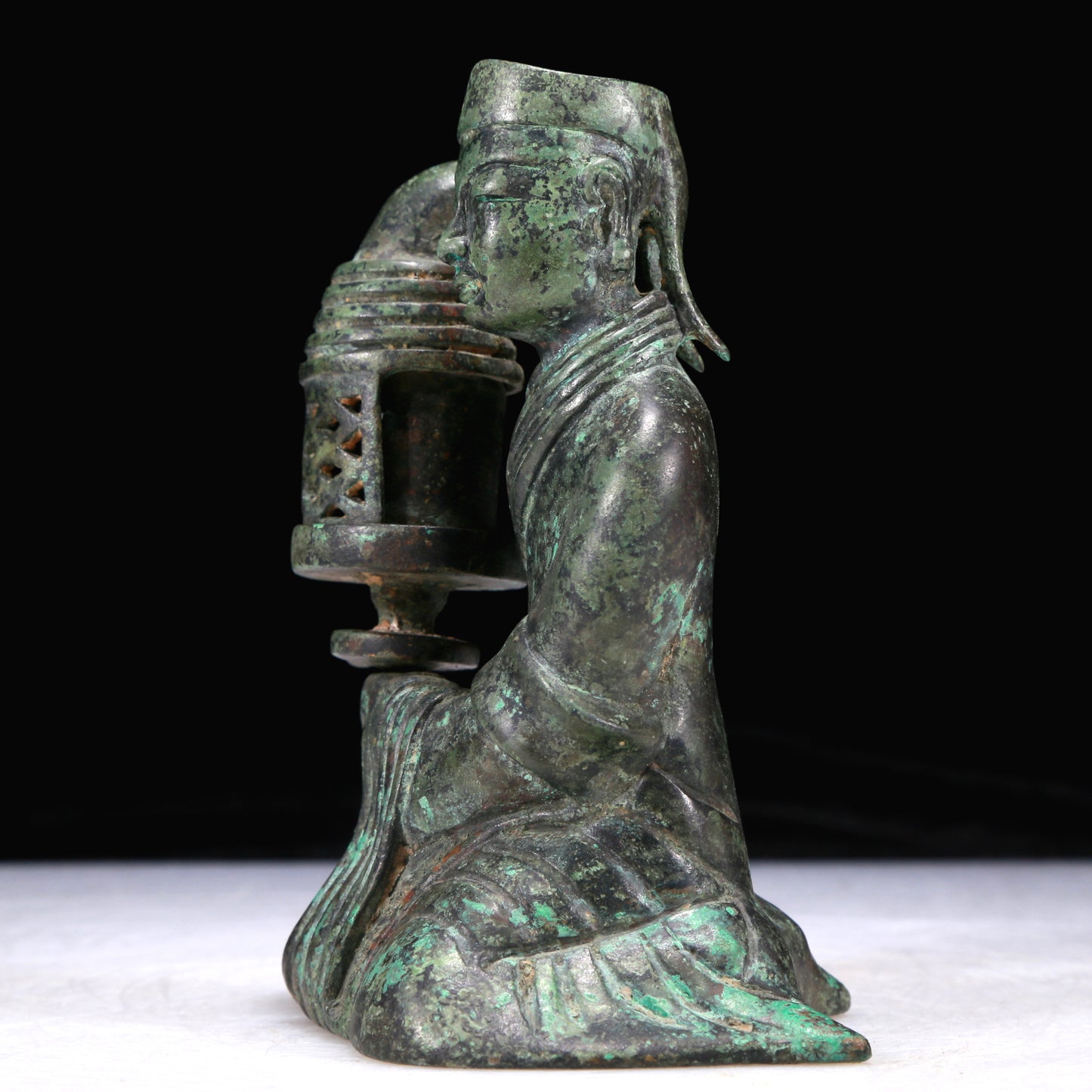 A Precious Bronze Figure-Form Candlestick