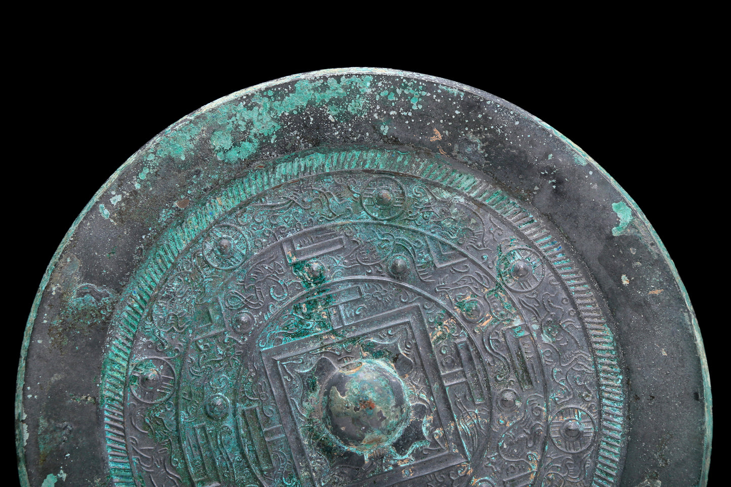 An Archaic Circular Bronze 'Auspicious Beast' Mirror