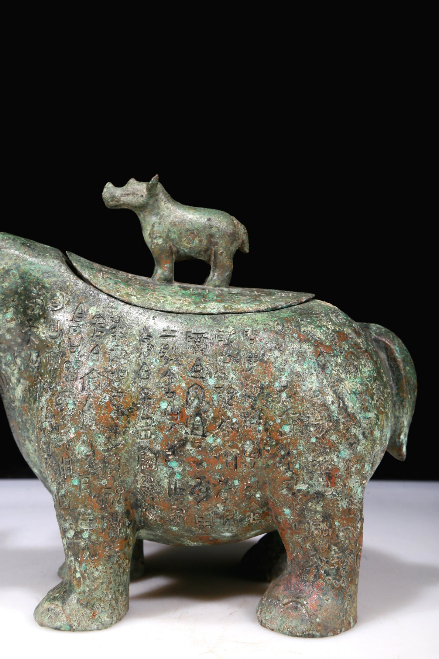 A Fantastic Bronze Rhinoceros-Form Jar With Inscriptions