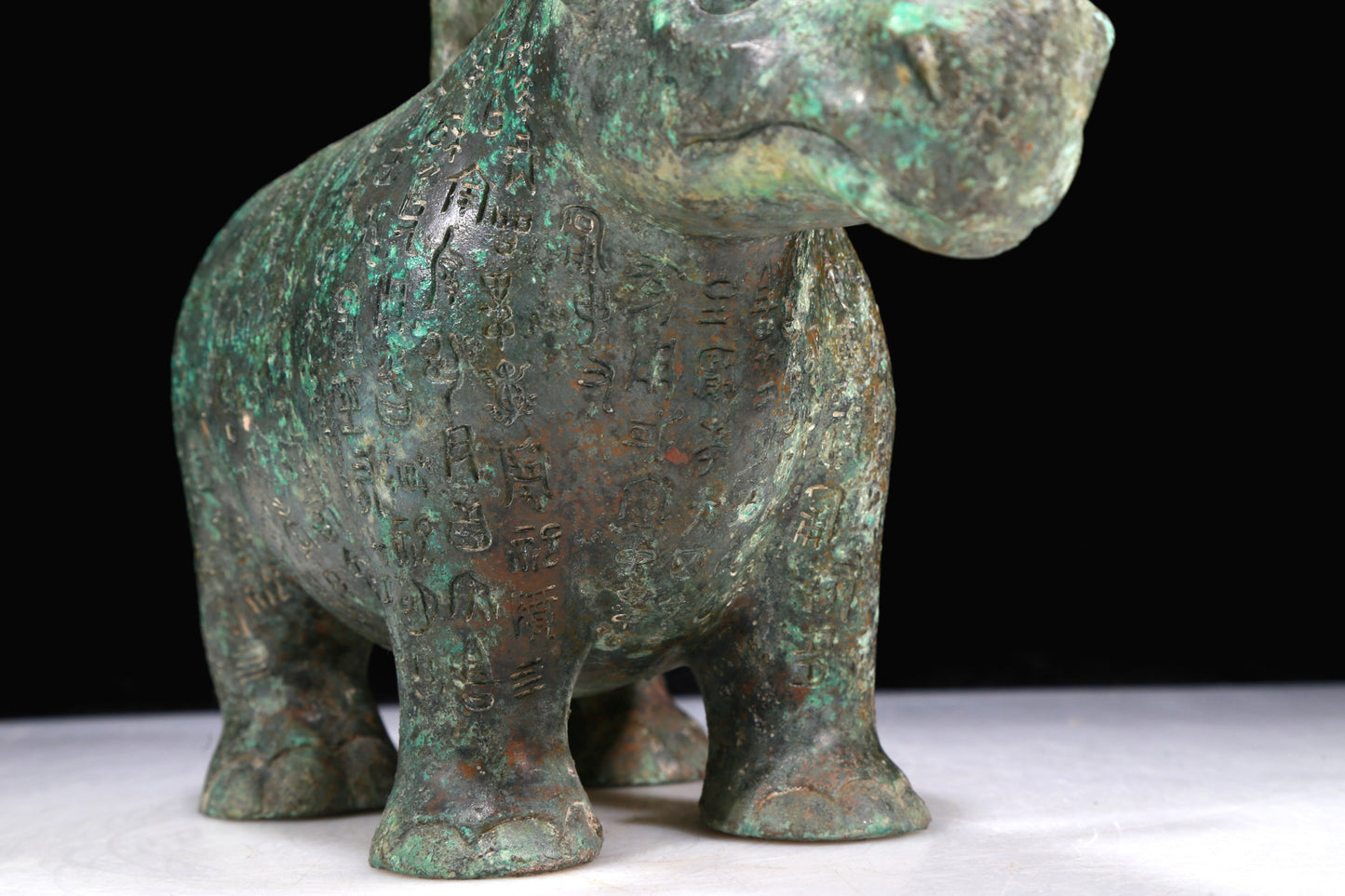 A Fantastic Bronze Rhinoceros-Form Jar With Inscriptions