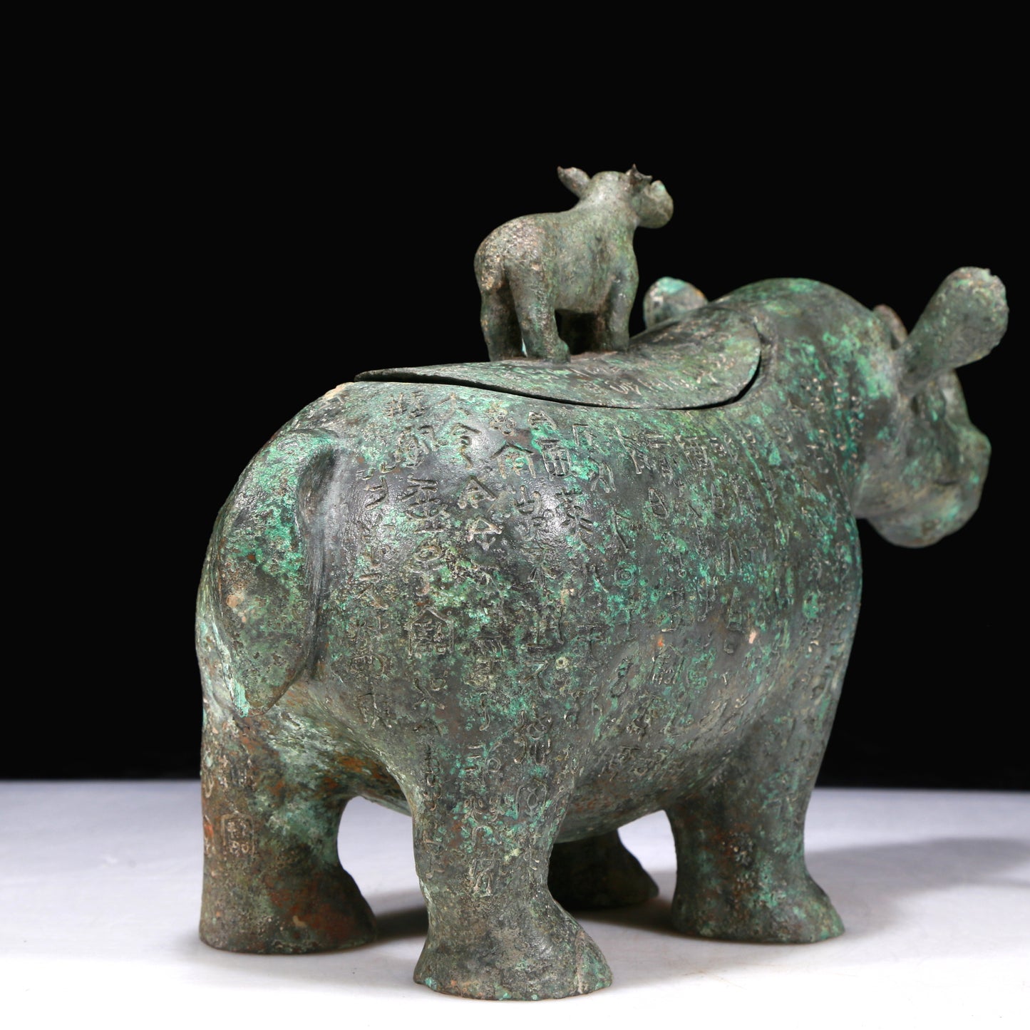 A Fantastic Bronze Rhinoceros-Form Jar With Inscriptions