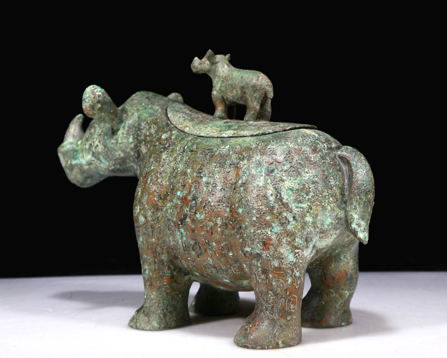 A Fantastic Bronze Rhinoceros-Form Jar With Inscriptions