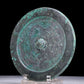 An Archaic Circular Bronze 'Auspicious Beast' Mirror