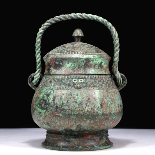 A Fantastic Bronze 'Animal Mask' Jar With Inscriptions And An Overhead Handle