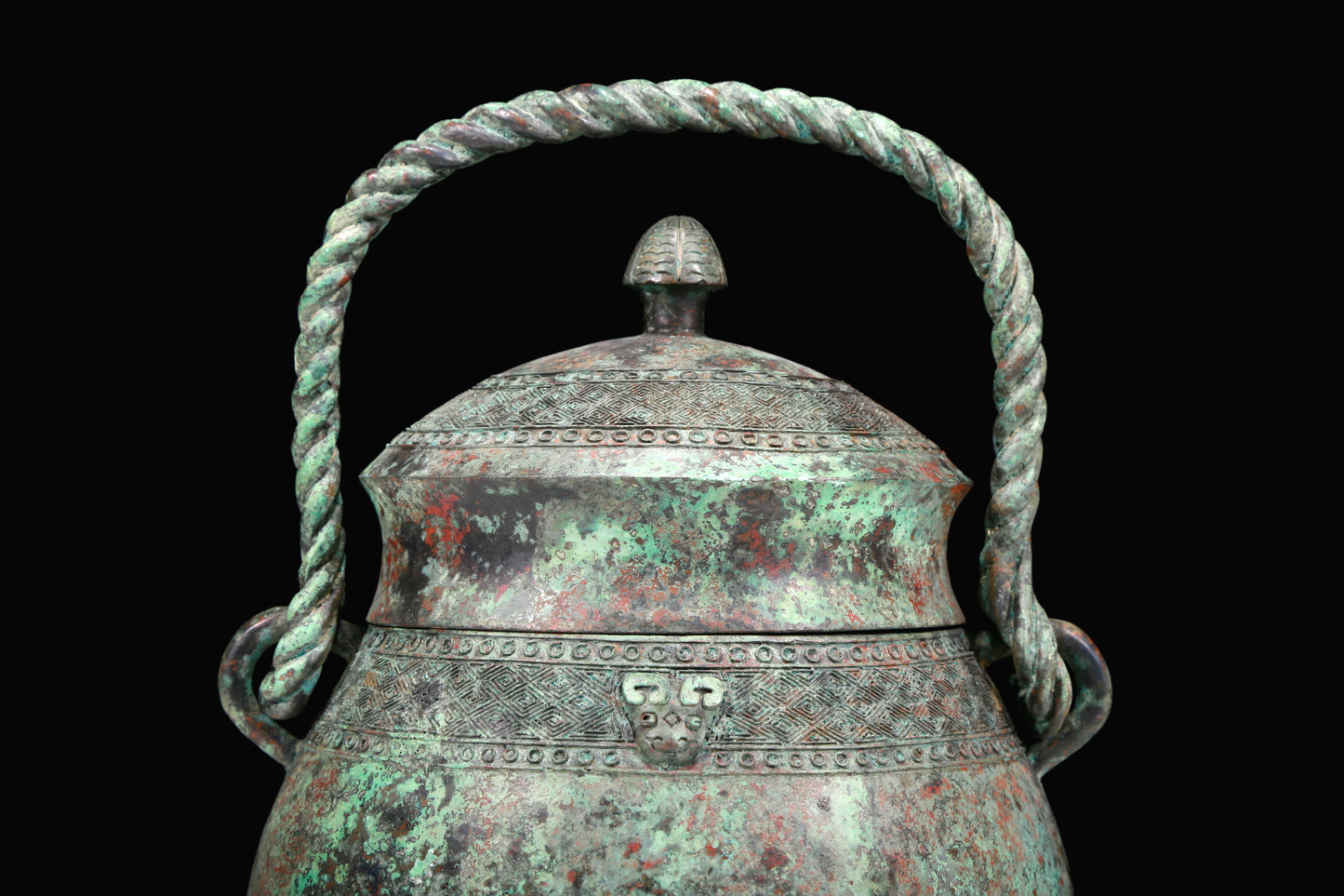 A Fantastic Bronze 'Animal Mask' Jar With Inscriptions And An Overhead Handle