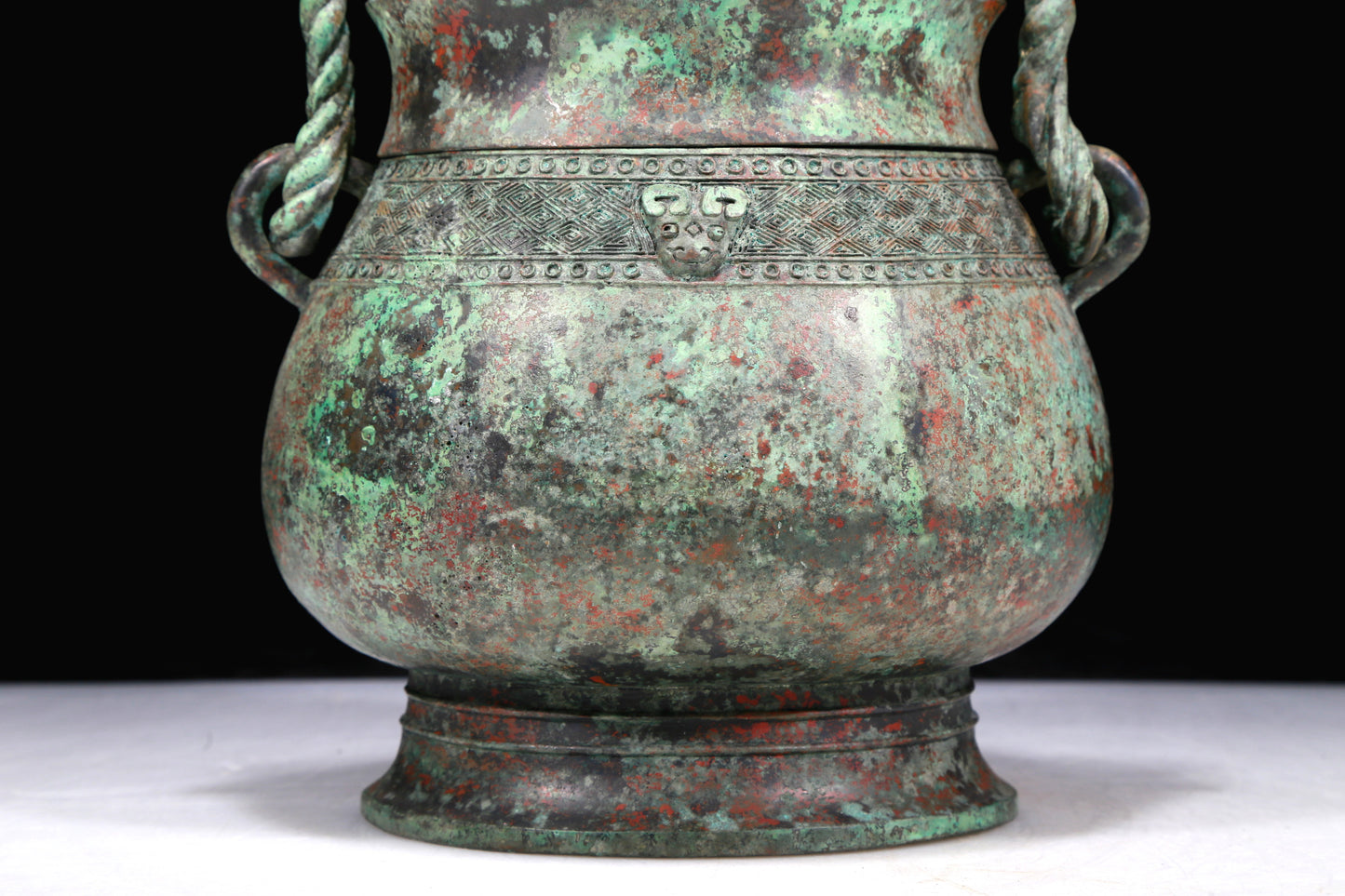 A Fantastic Bronze 'Animal Mask' Jar With Inscriptions And An Overhead Handle