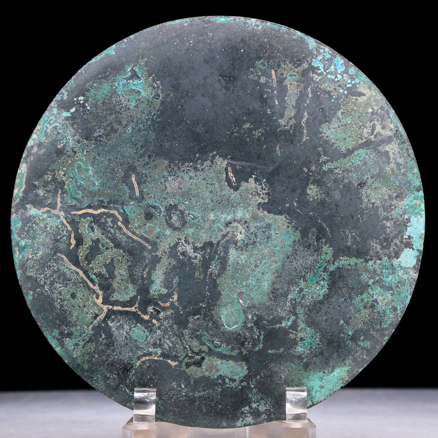 An Archaic Circular Bronze 'Auspicious Beast' Mirror