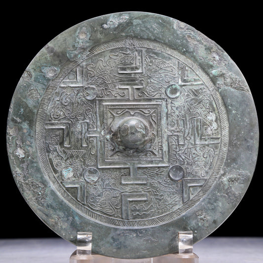 An Archaic Circular Bronze 'Auspicious Beast' Mirror