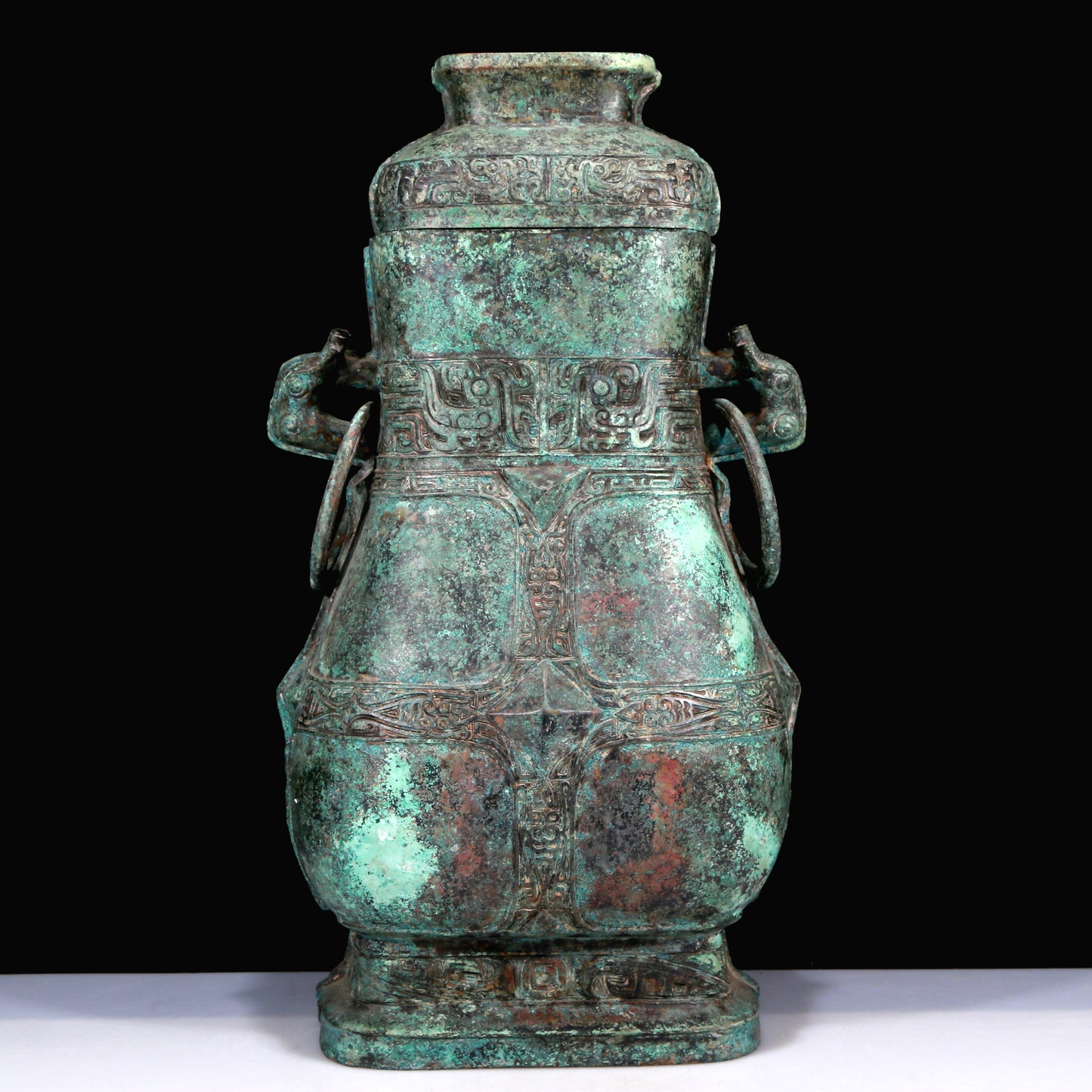 A Huge Archaic Bronze 'Animal Mask' Vase And Cover With Inscriptions