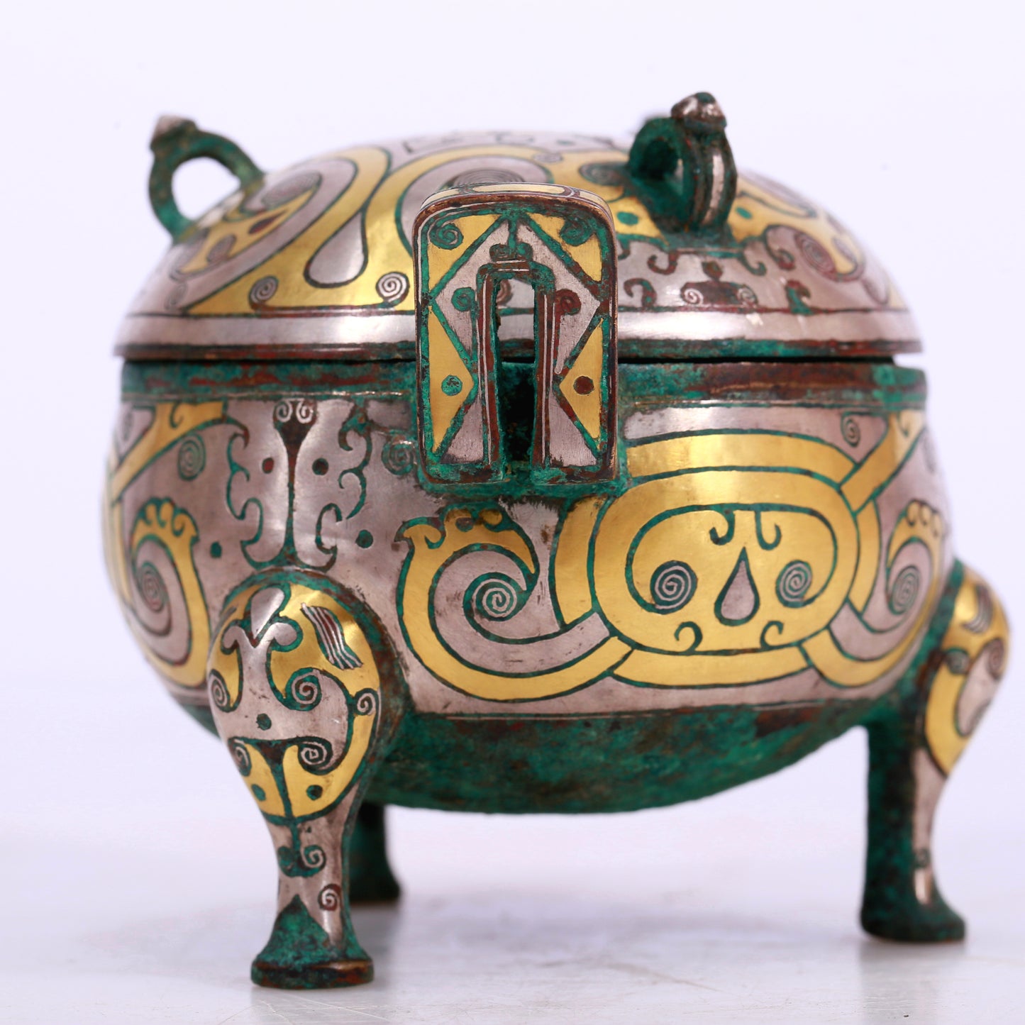 An Archaic Bronze Silver-Inlaid 'Flower' Tripod Censer And Cover