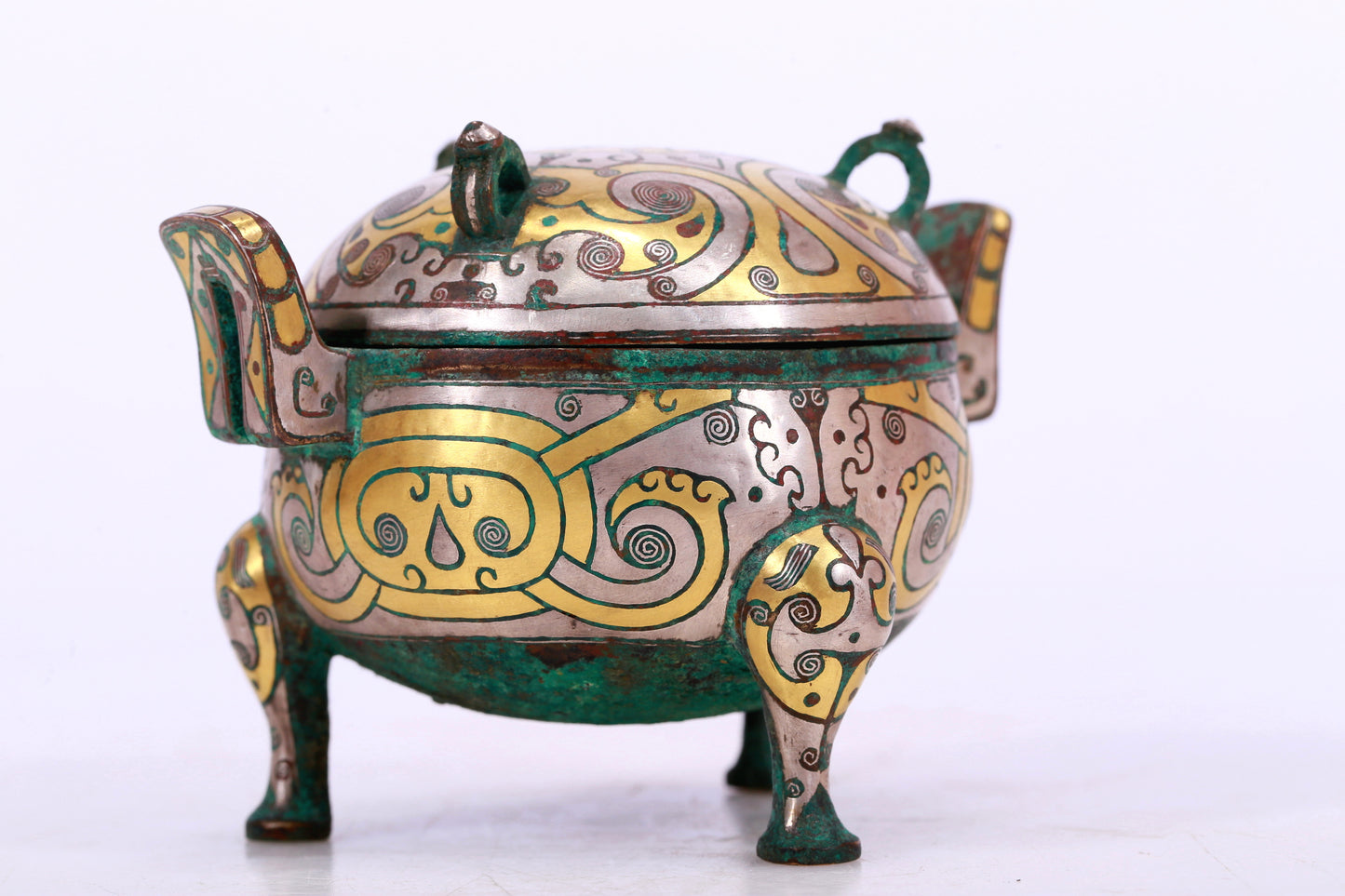 An Archaic Bronze Silver-Inlaid 'Flower' Tripod Censer And Cover