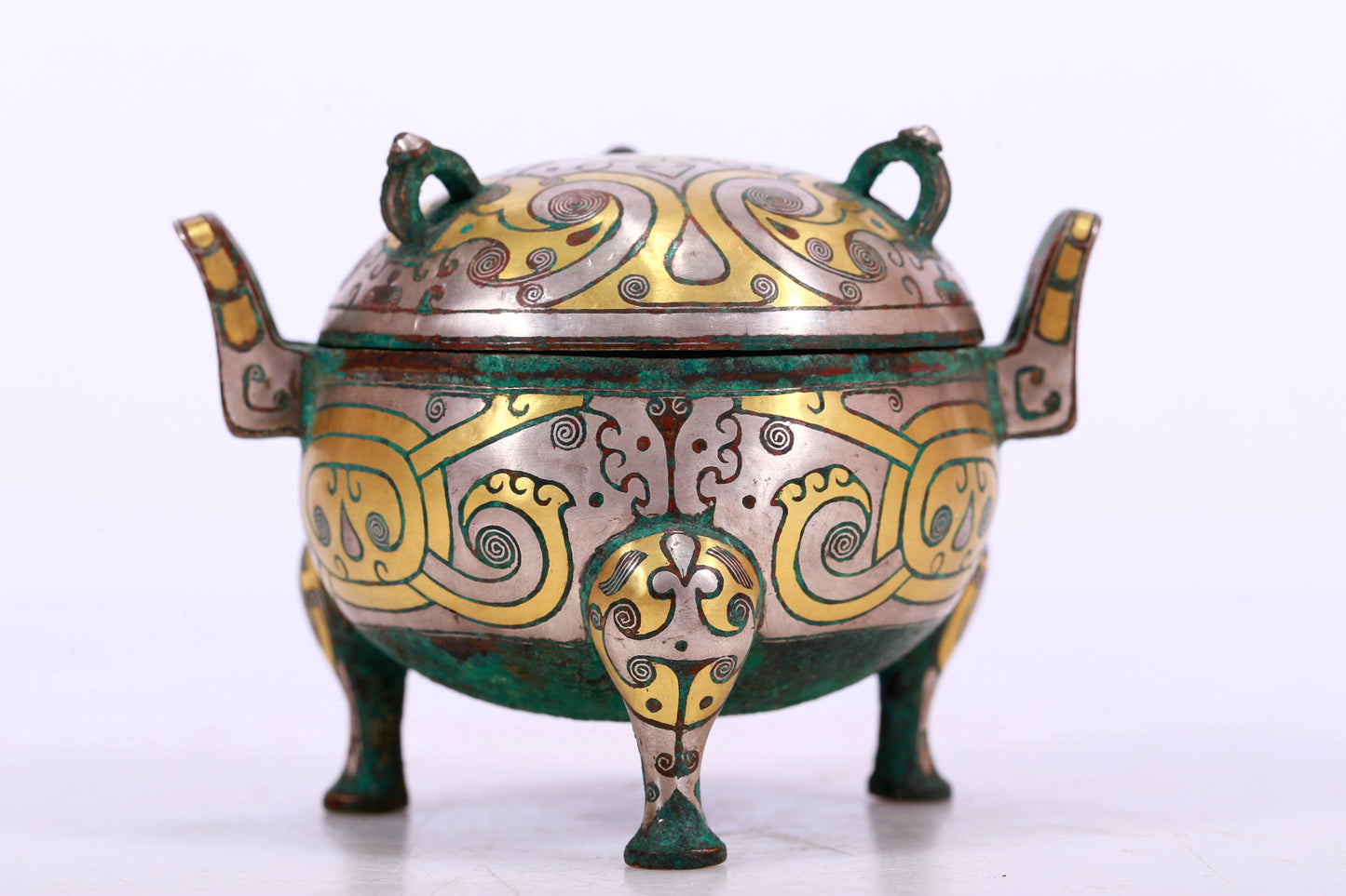 An Archaic Bronze Silver-Inlaid 'Flower' Tripod Censer And Cover