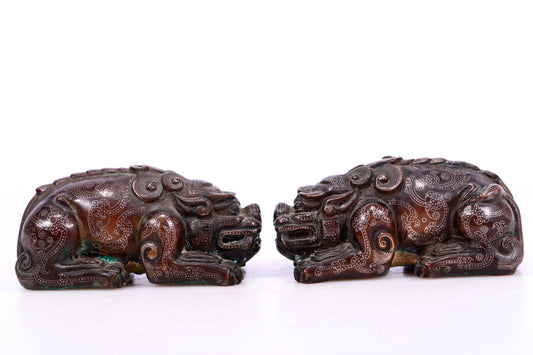 A Marvelous Pair Of Bronze Silver-Inlaid Auspicious Beasts