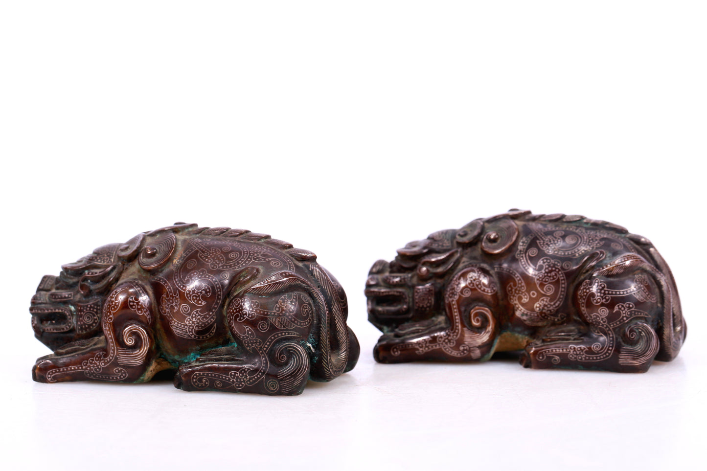 A Marvelous Pair Of Bronze Silver-Inlaid Auspicious Beasts