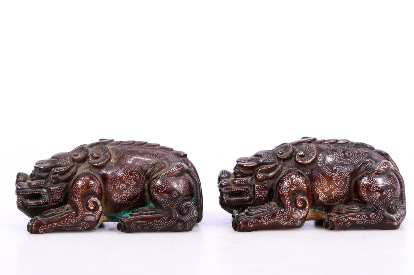 A Marvelous Pair Of Bronze Silver-Inlaid Auspicious Beasts