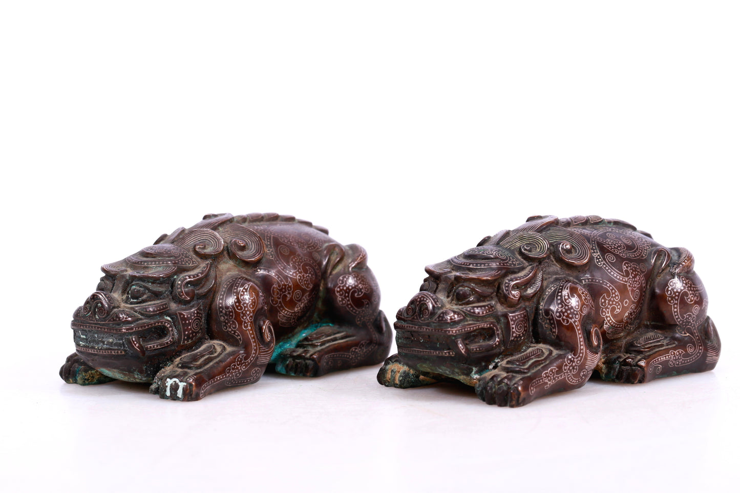 A Marvelous Pair Of Bronze Silver-Inlaid Auspicious Beasts