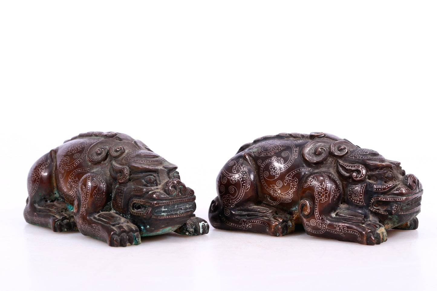 A Marvelous Pair Of Bronze Silver-Inlaid Auspicious Beasts