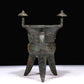 A Marvelous Bronze 'Animal Mask' Tripod Cup