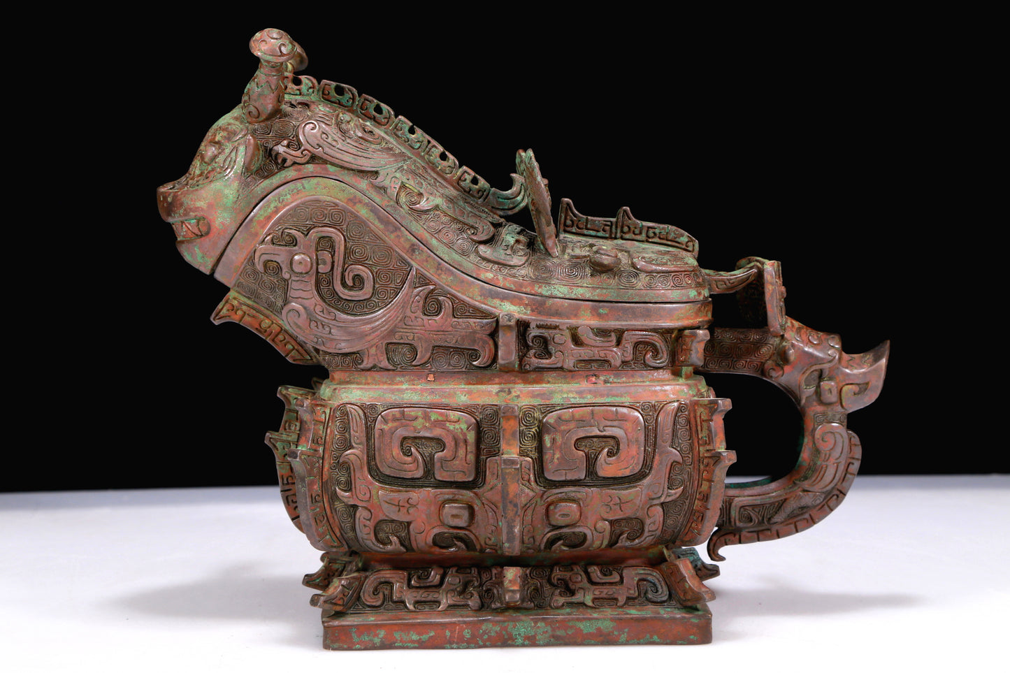 A Marvelous Bronze 'Animal Mask' Ewer And Cover With Inscriptions