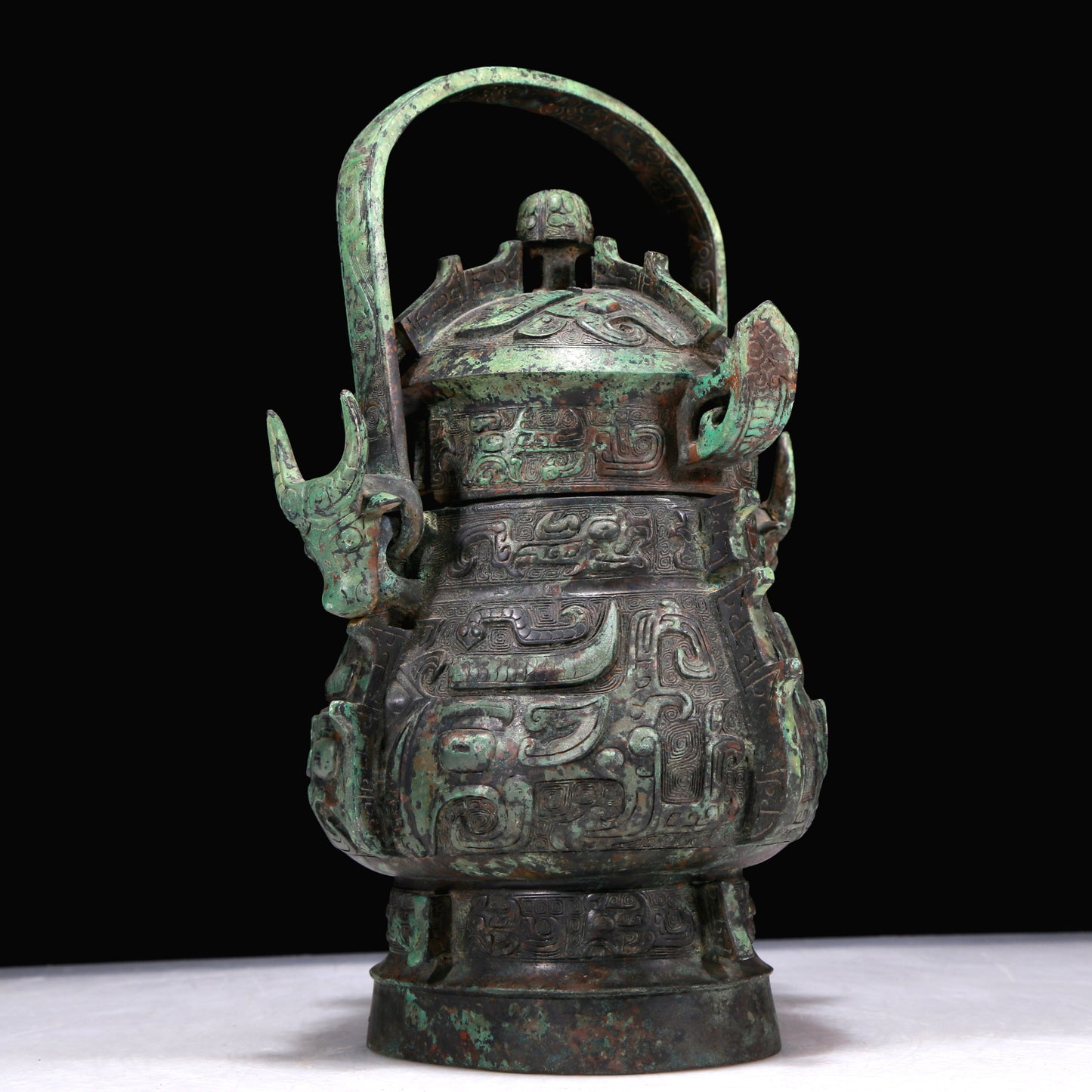 A Marvelous Bronze 'Animal Mask' Pot With Inscriptions