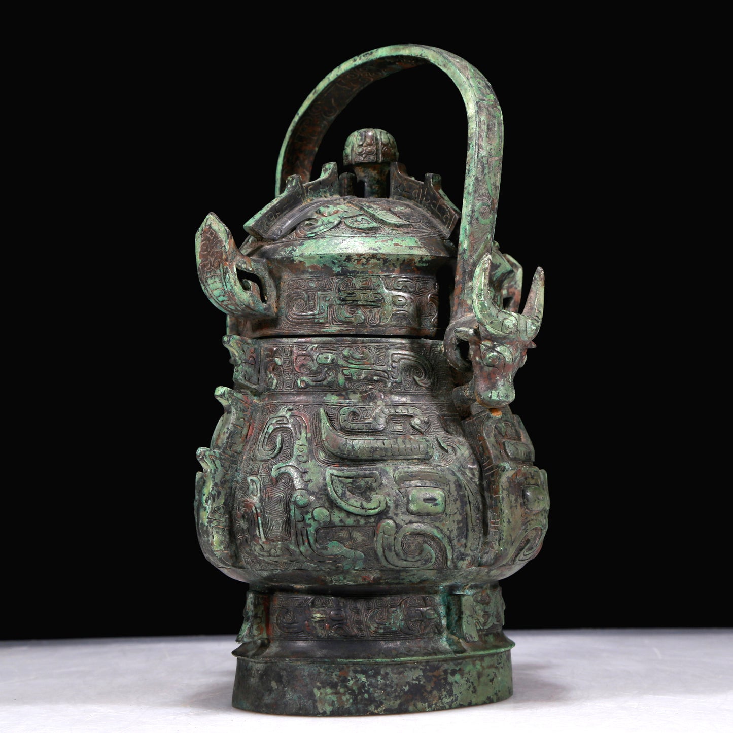 A Marvelous Bronze 'Animal Mask' Pot With Inscriptions