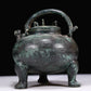 A Marvelous Bronze 'Auspicious Beast' Tripod Ewer