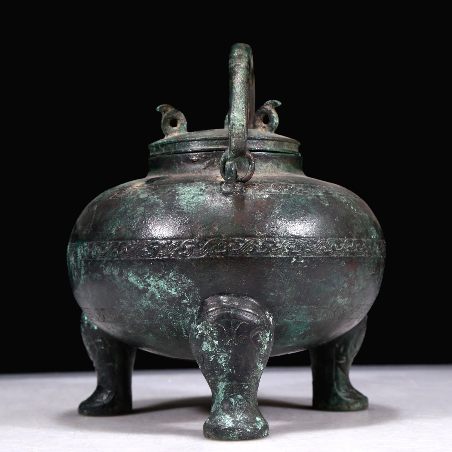 A Marvelous Bronze 'Auspicious Beast' Tripod Ewer