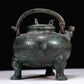 A Marvelous Bronze 'Auspicious Beast' Tripod Ewer